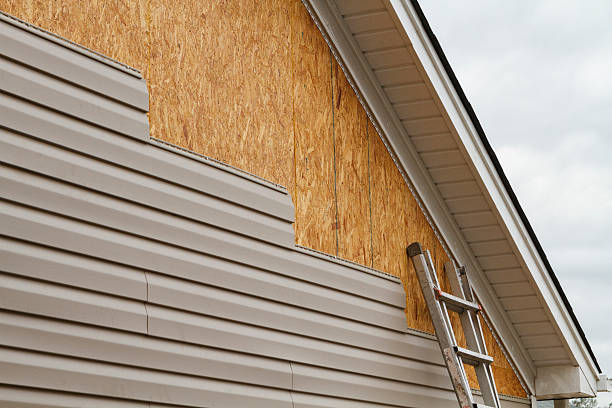Professional Siding Installation technician working in Renton, WA